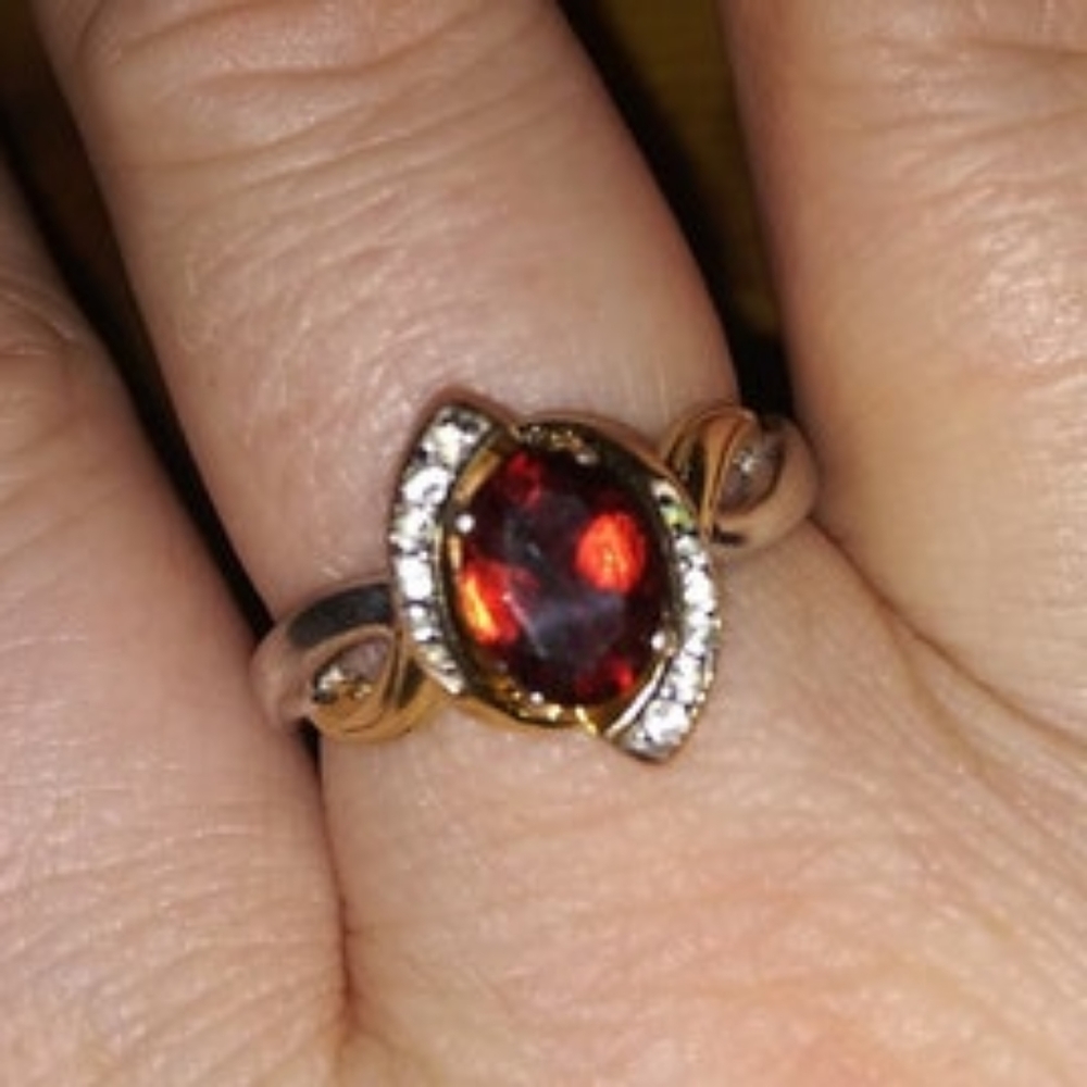 Lab Created Ruby And Topaz Ge Ring - image 1